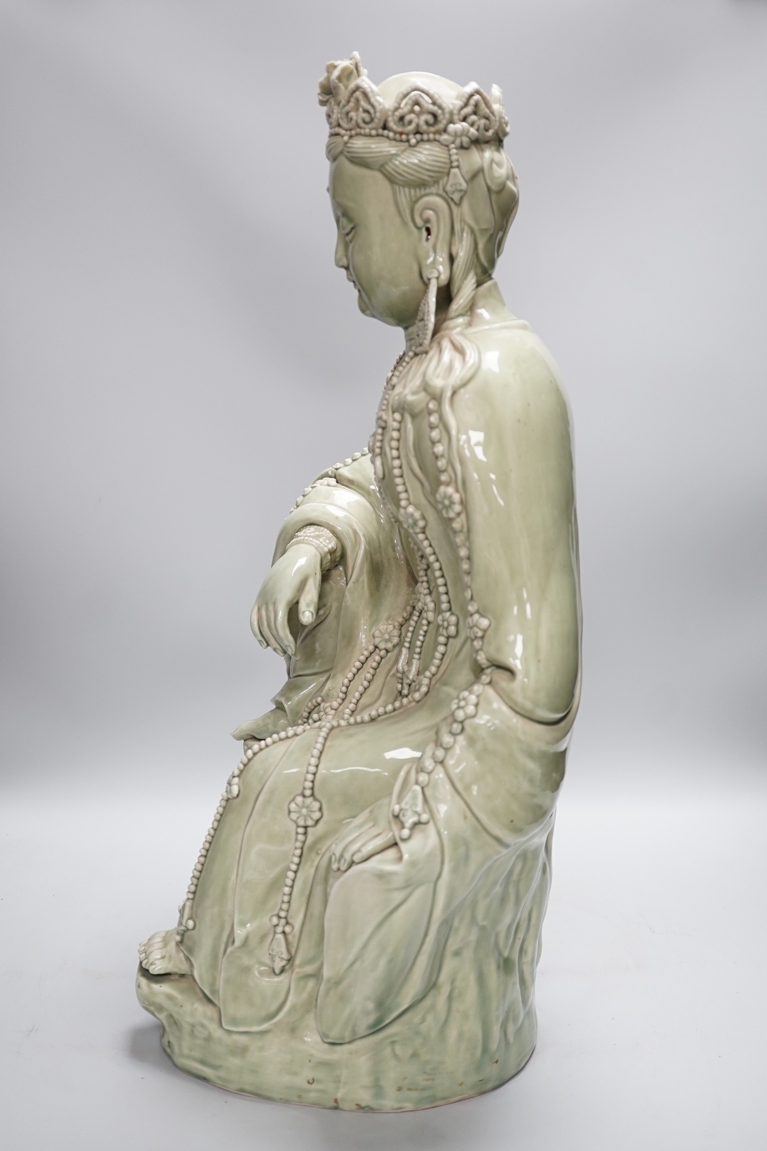 A Chinese celadon glazed empress figure, 55cm